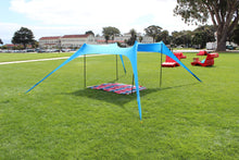 The SunBear Shade becomes a canopy with 4 poles and can also be set up on grass with corkscrew tent stakes